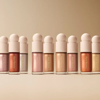 Rare Beauty – Iluminador líquido Positive Light Luminizer